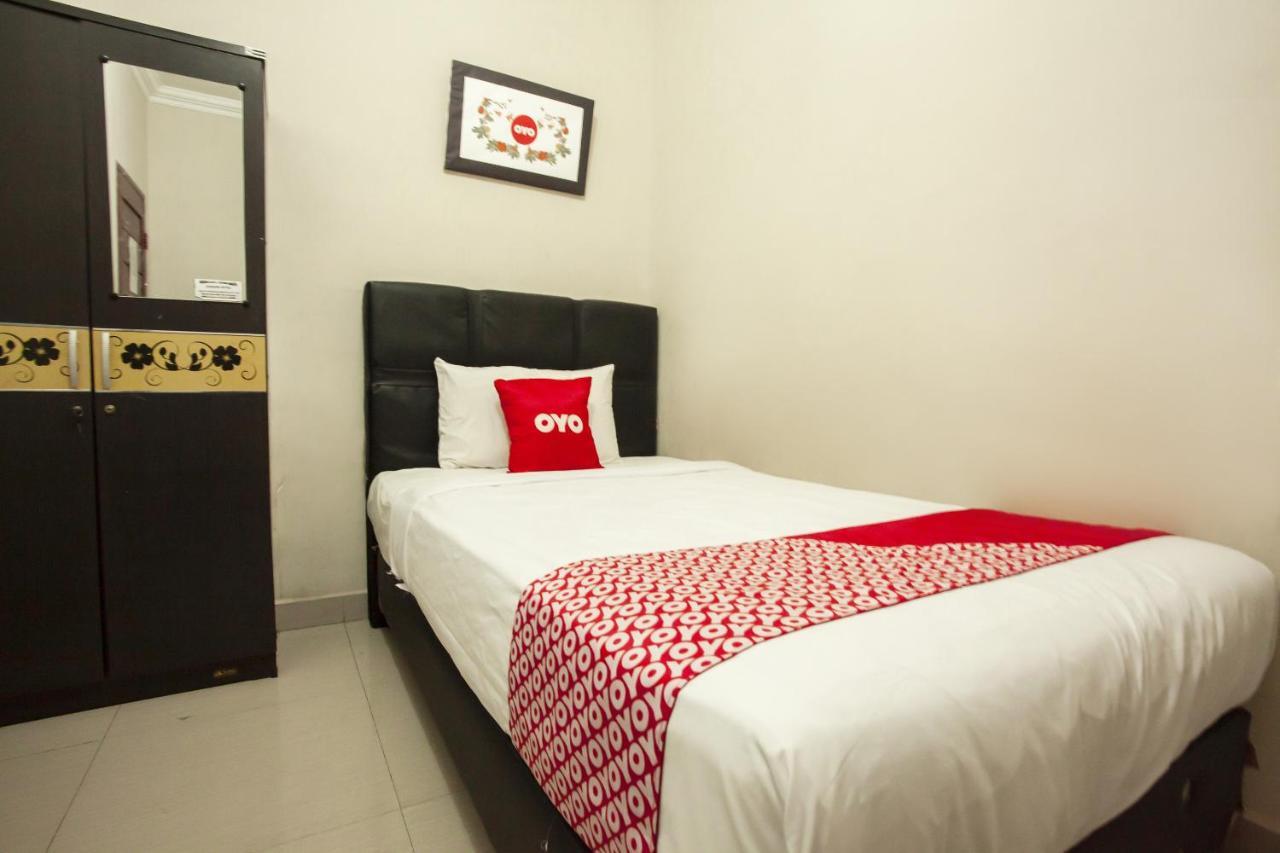 Oyo 1631 Hotel Apple Perdagangan-Tomuon Exterior foto