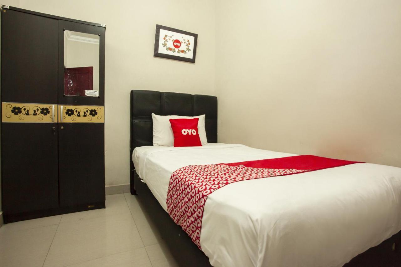Oyo 1631 Hotel Apple Perdagangan-Tomuon Exterior foto